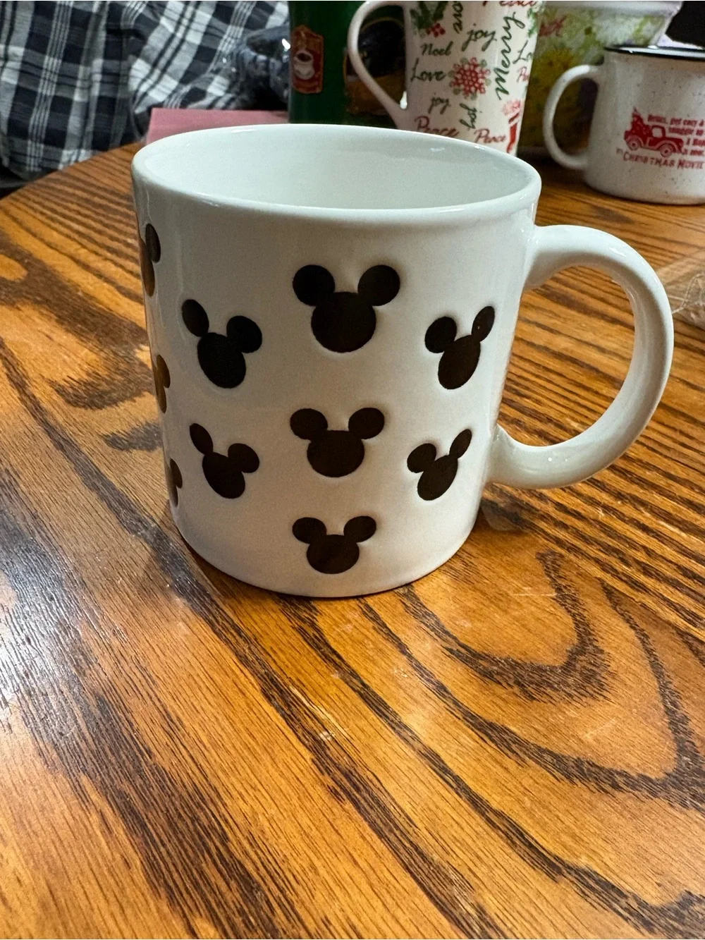 Disney white mug in EUC with black Mickey Mouse silhouette